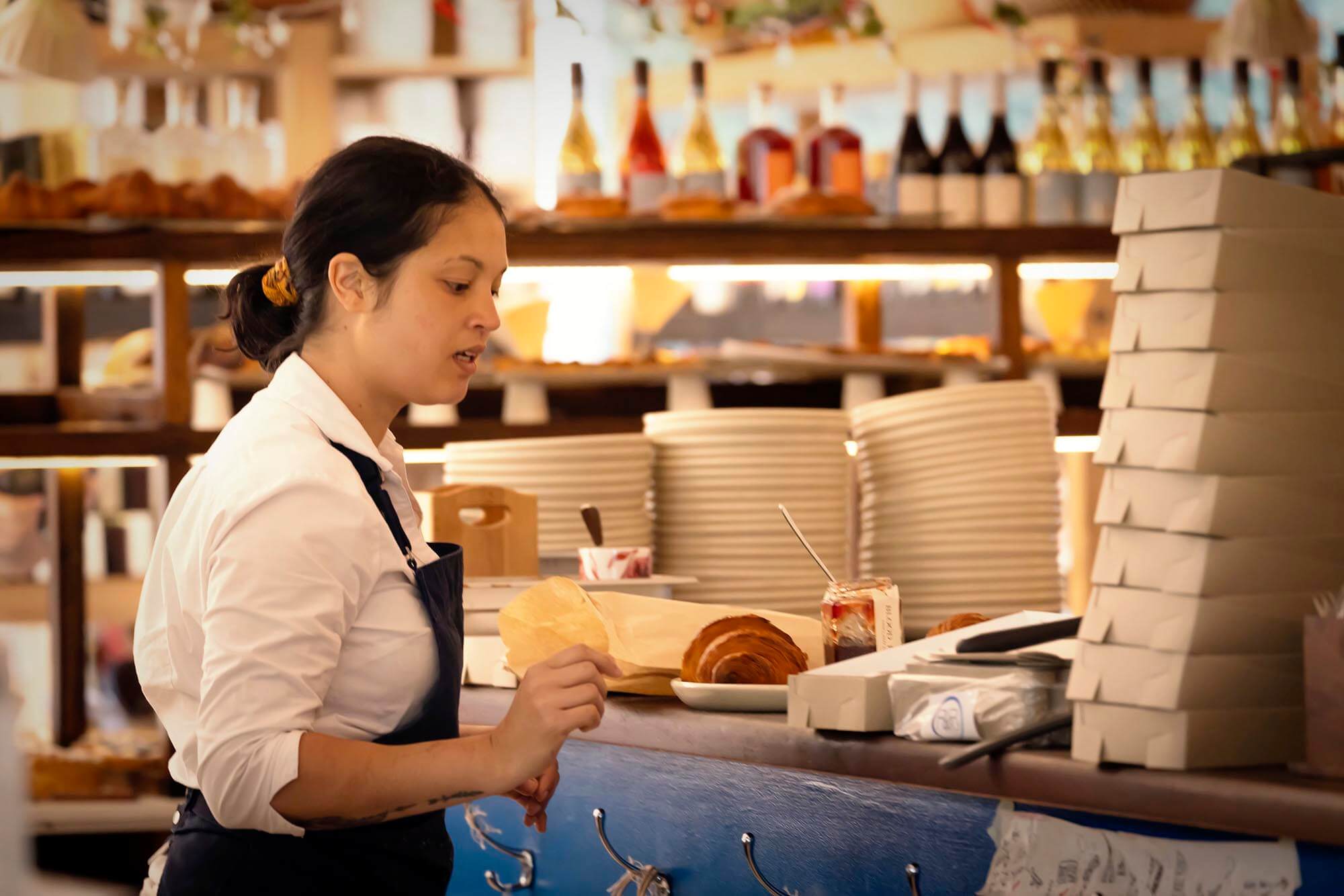 A waitress serving an order